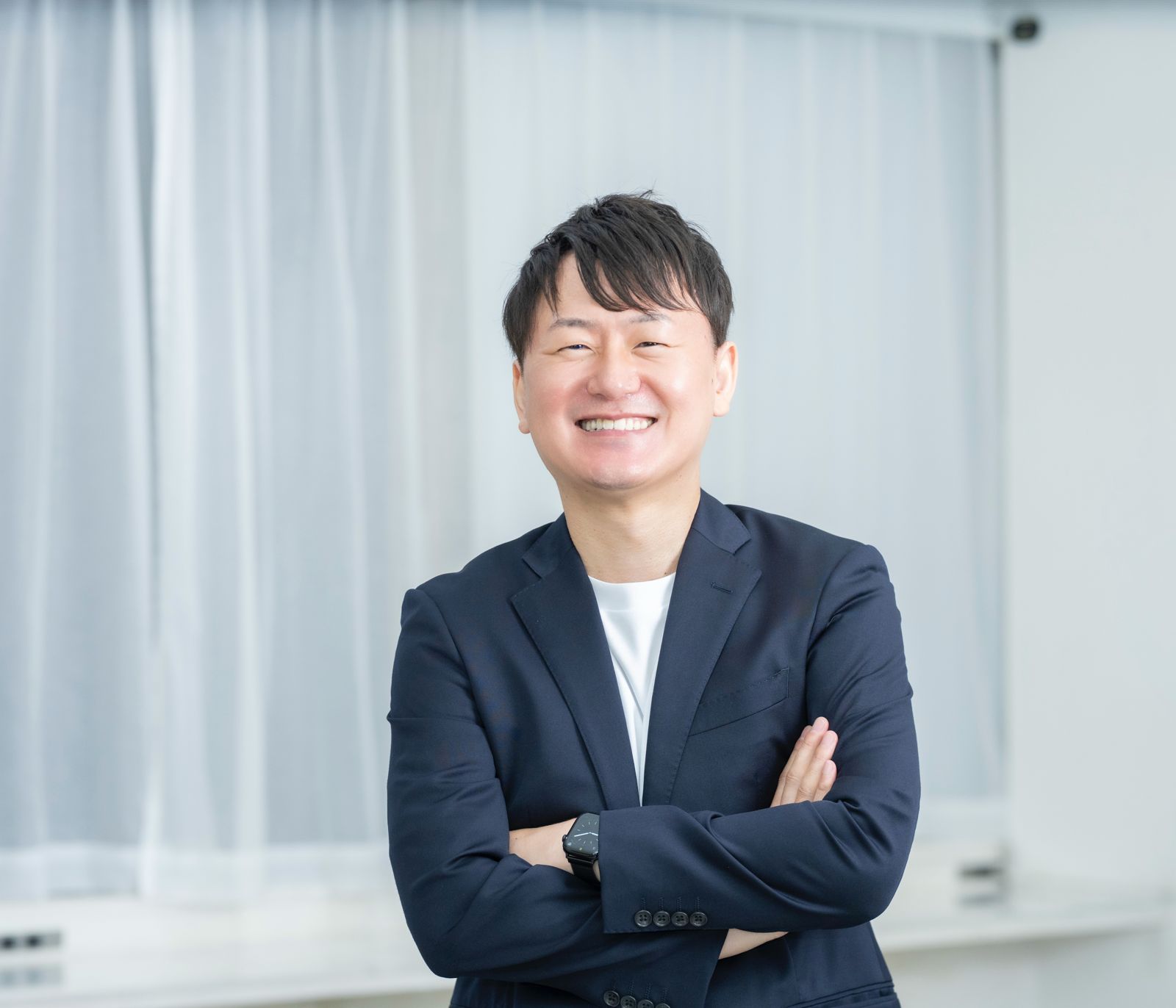 経営戦略室長 秋元秀夫